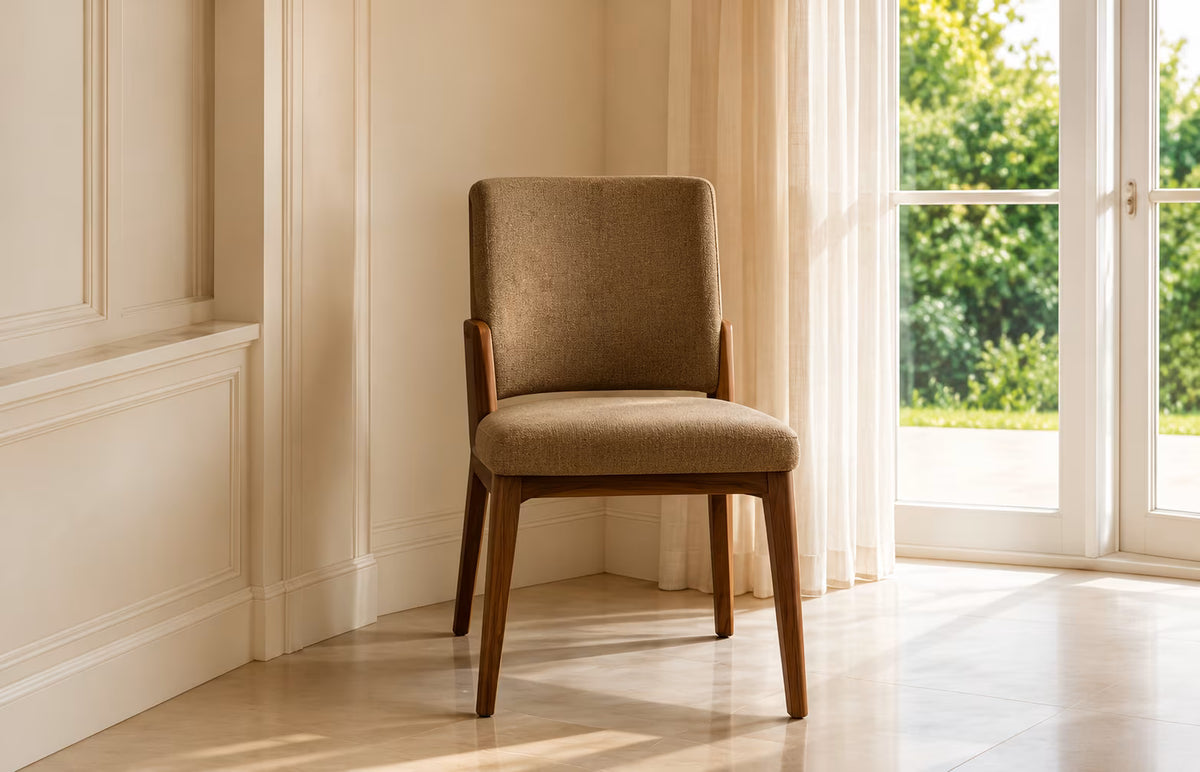 Single dining chair with open space beside a window