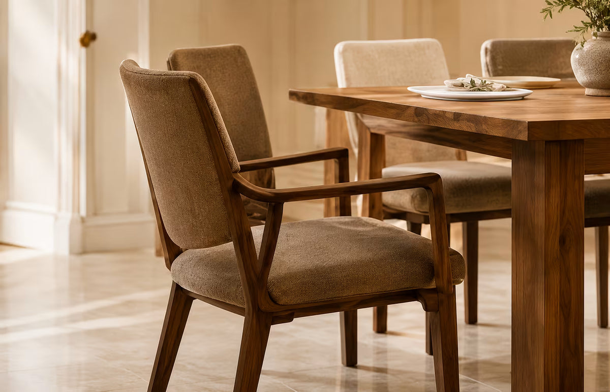 Armchair pulled out from a wooden dining table