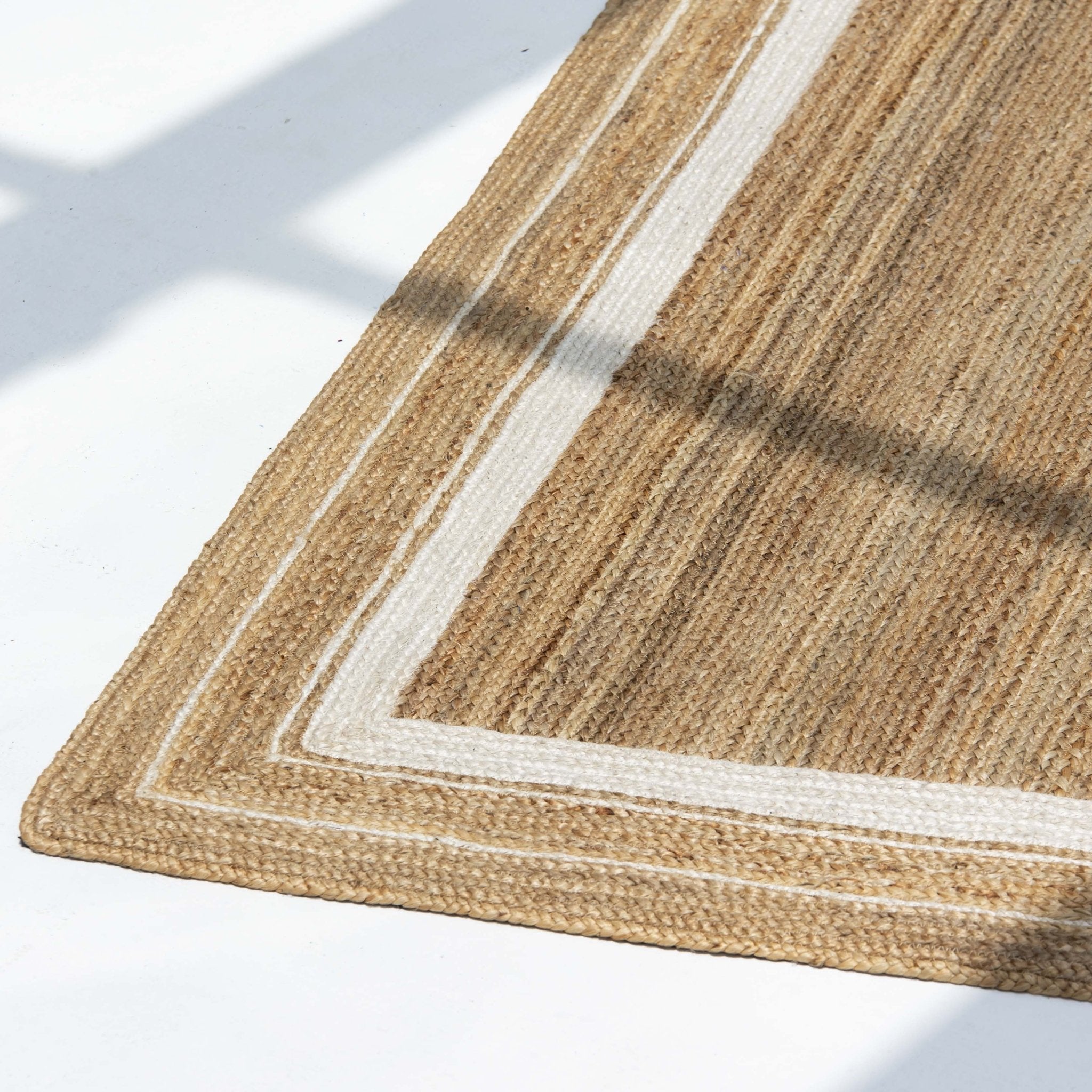 IVORY EDGE NATURAL JUTE HANDMADE RUG - Art and craft furniture