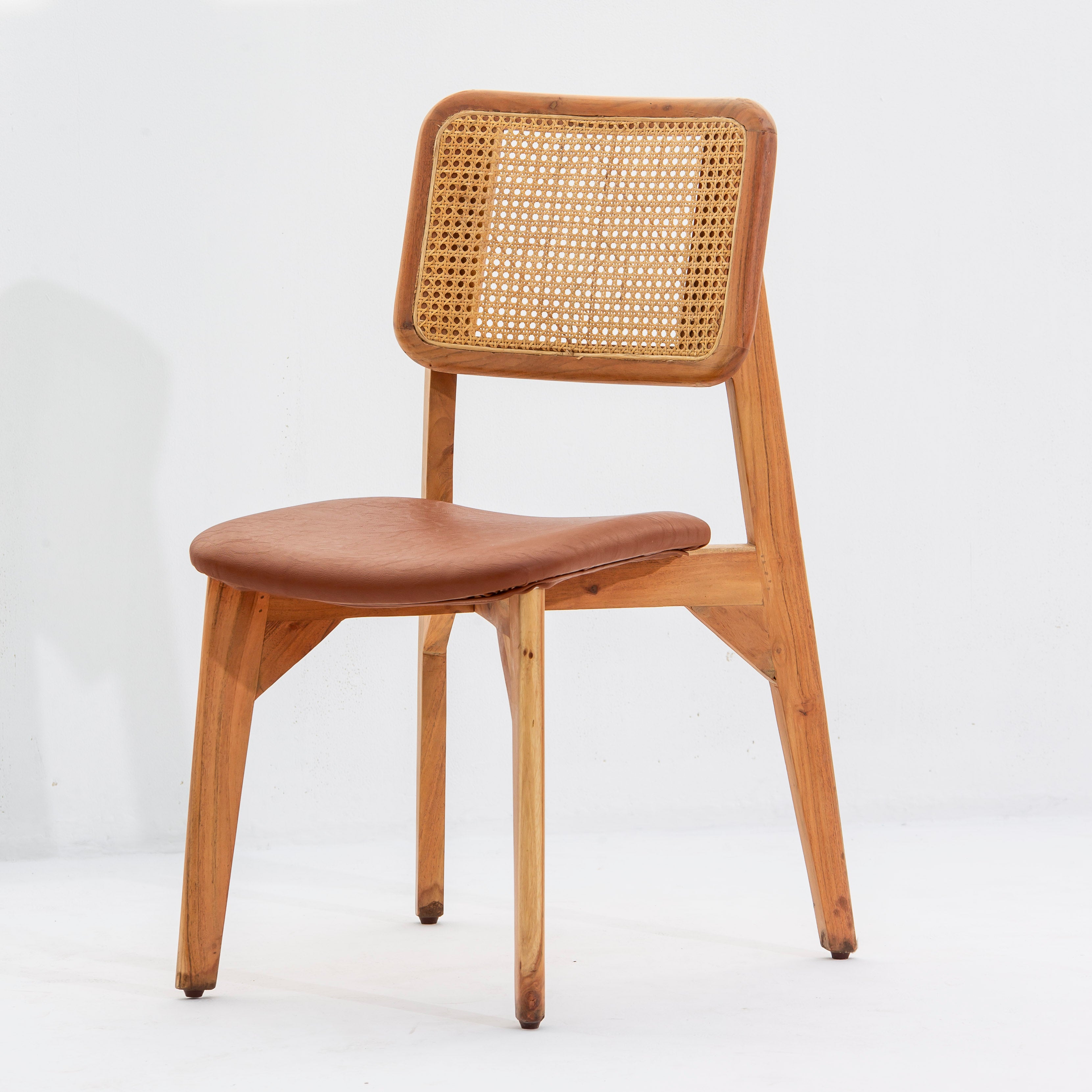 THE SIGNATURE LEATHER CANE CHAIR