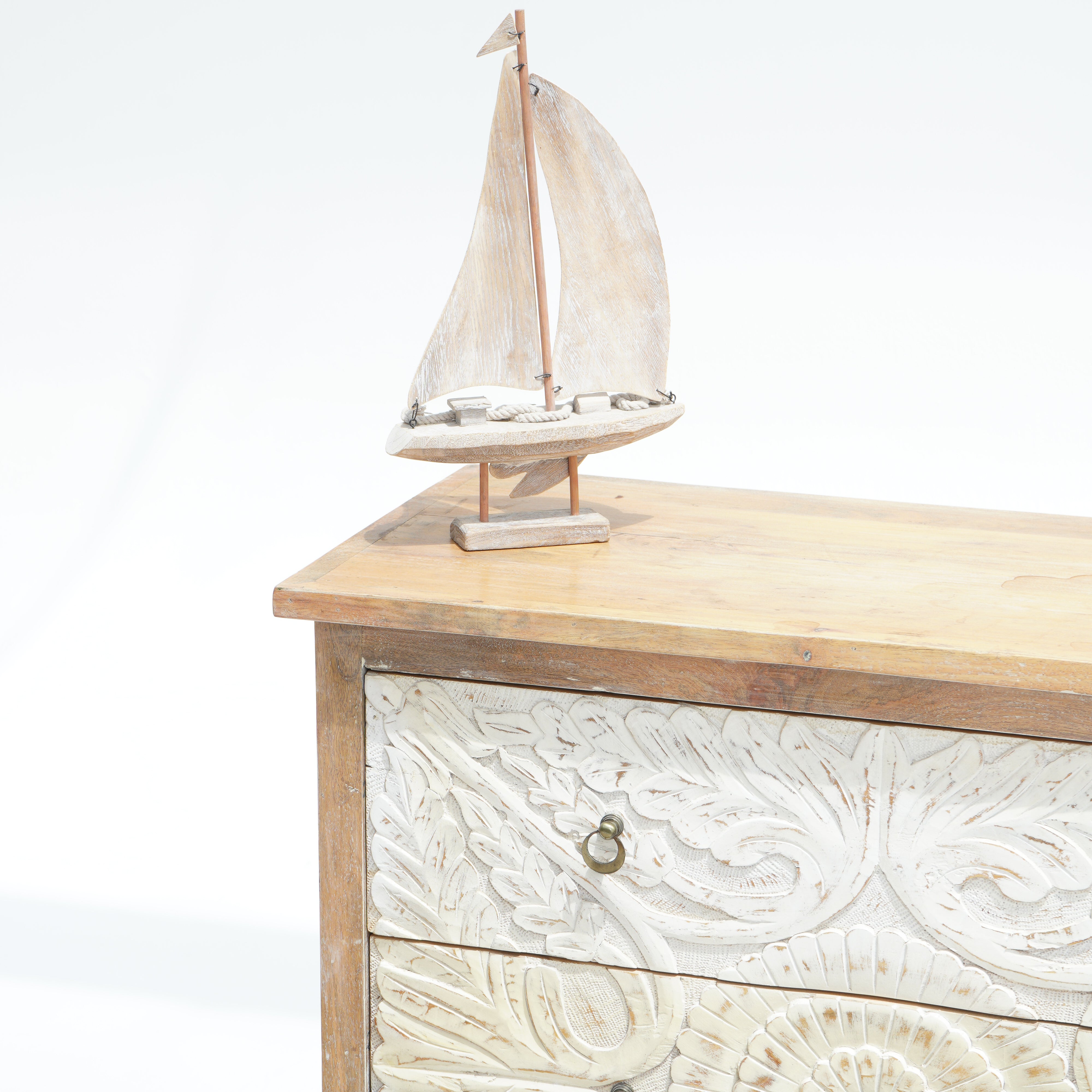 Artcian crafted  carwed three drawer chest of drawer