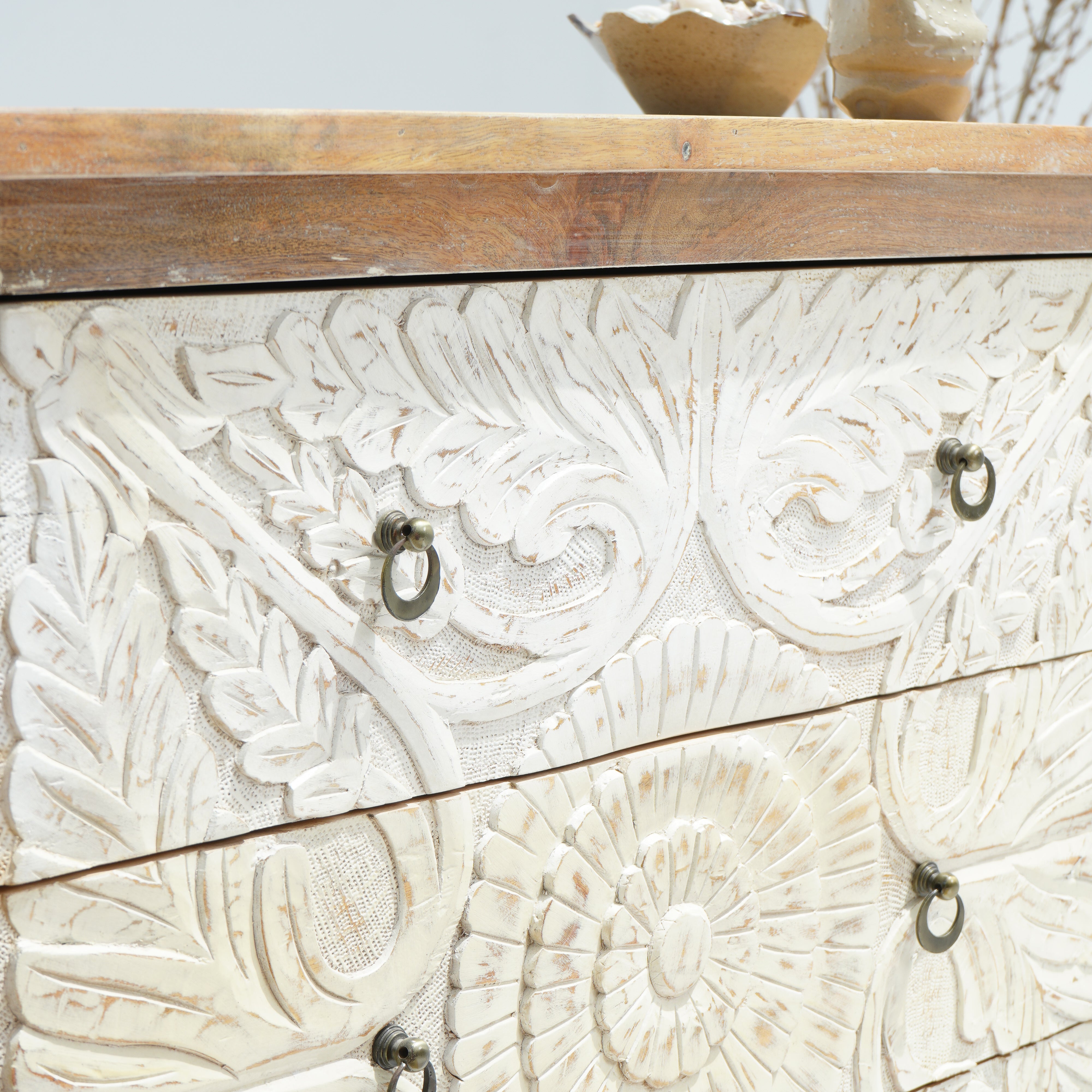 Artcian crafted  carwed three drawer chest of drawer