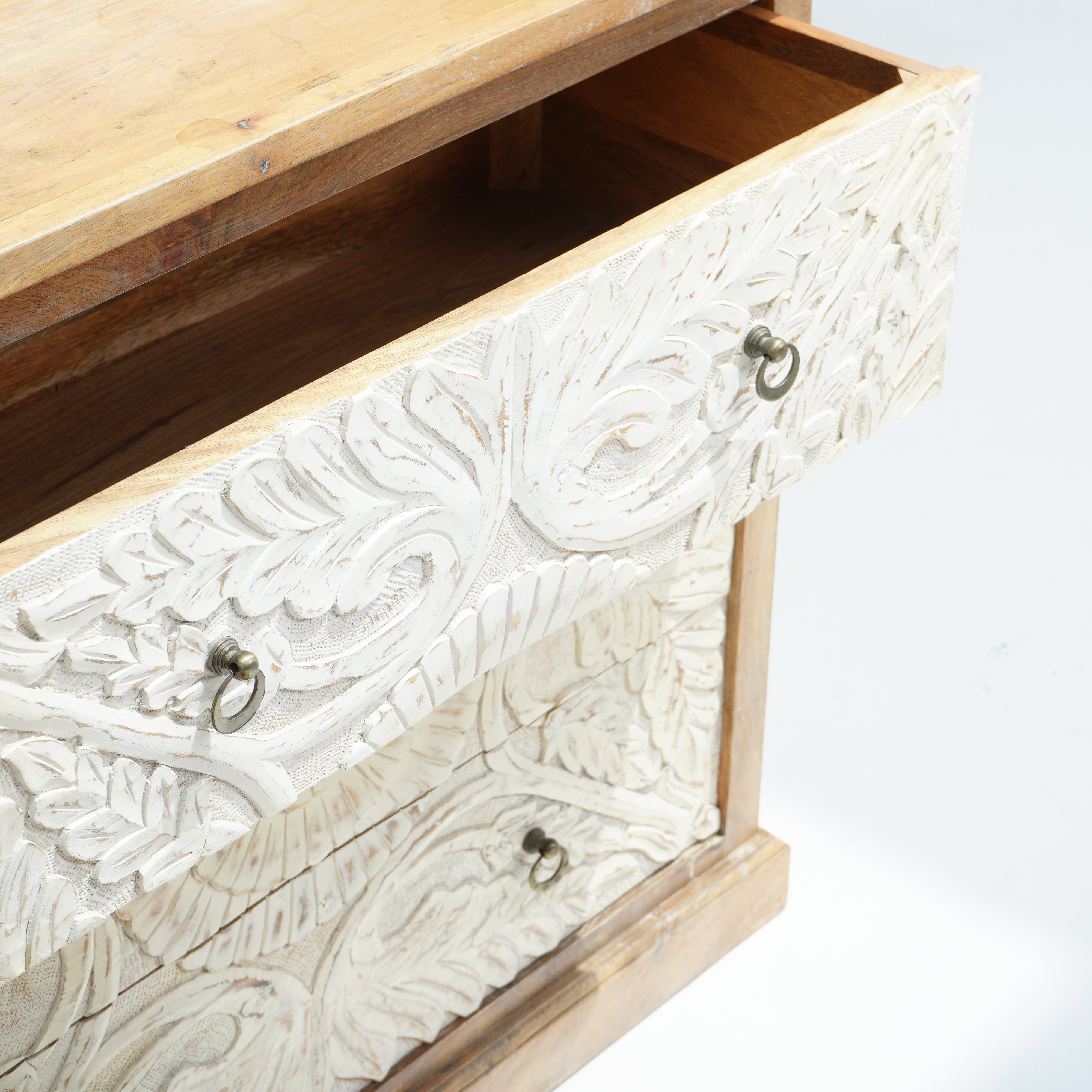Artcian crafted  carwed three drawer chest of drawer