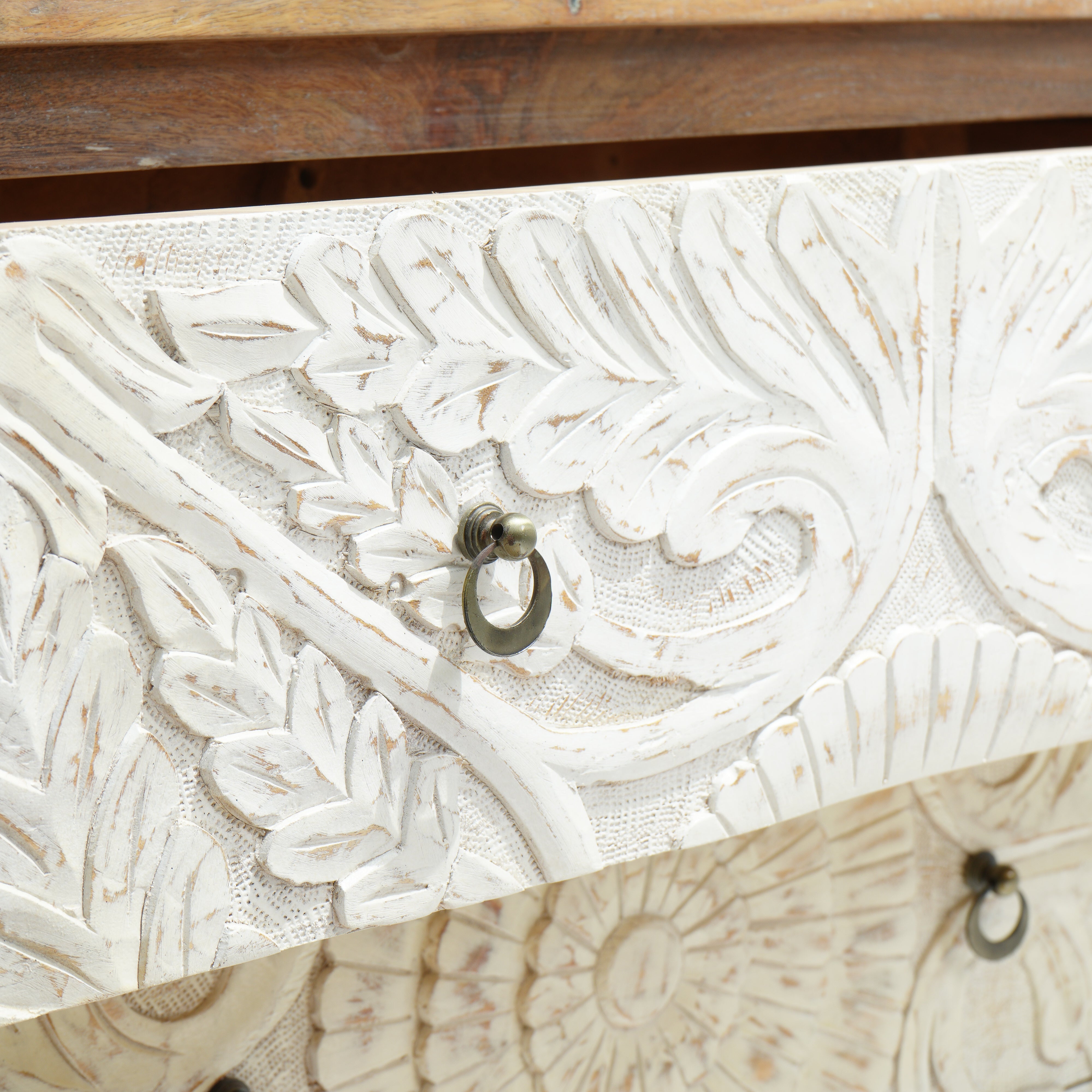 Artcian crafted  carwed three drawer chest of drawer