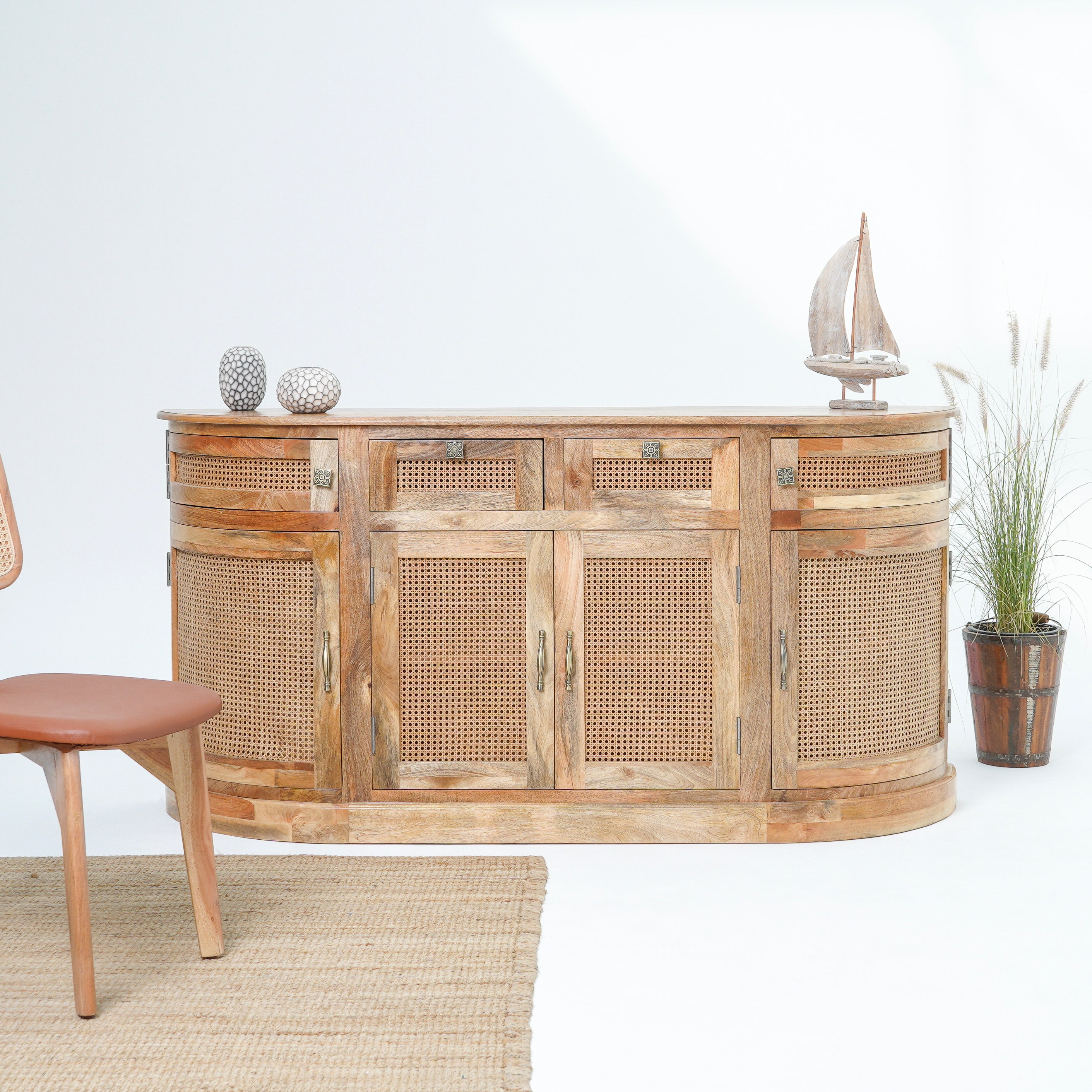 The Roslin cane four door four drawer sideboard