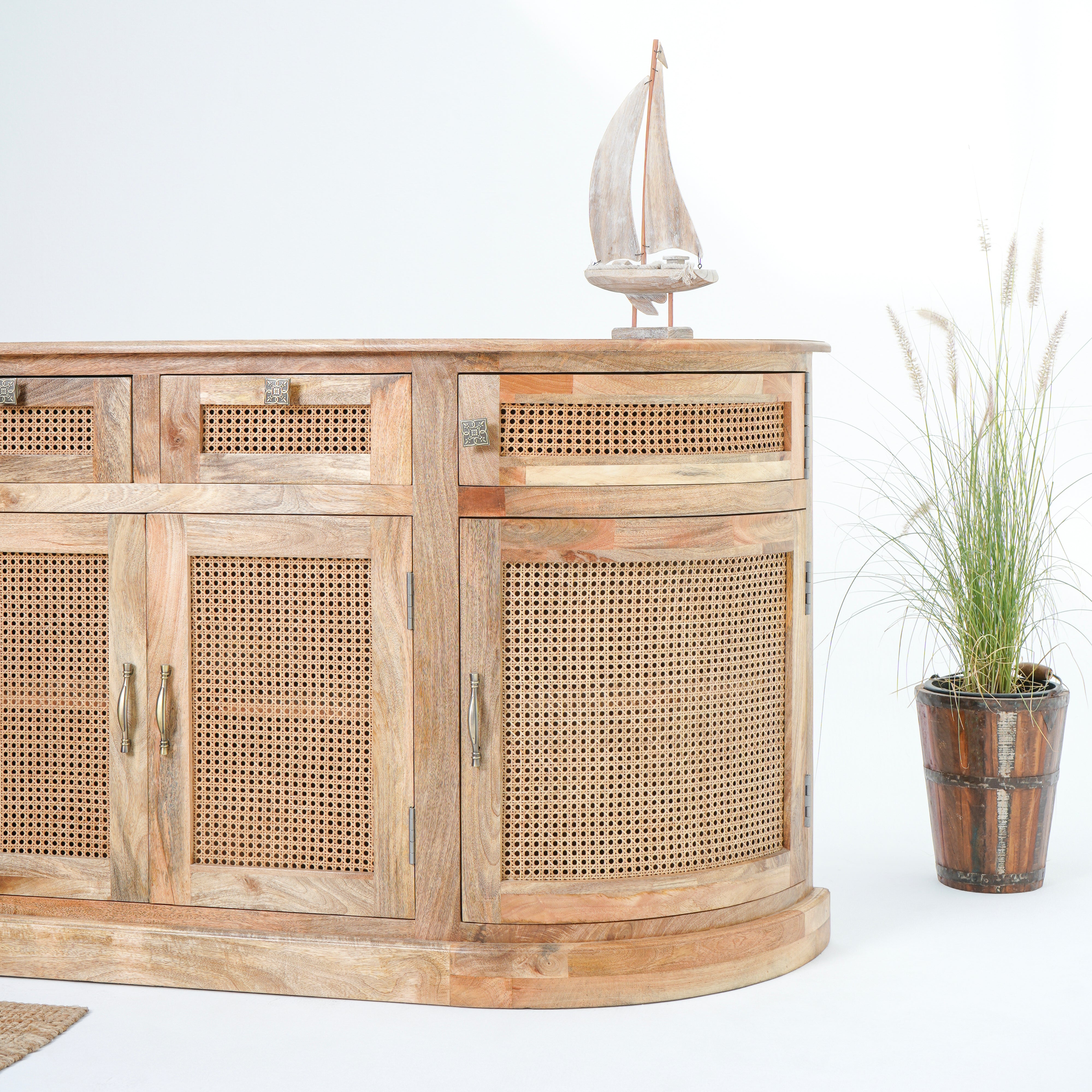 The Roslin cane four door four drawer sideboard