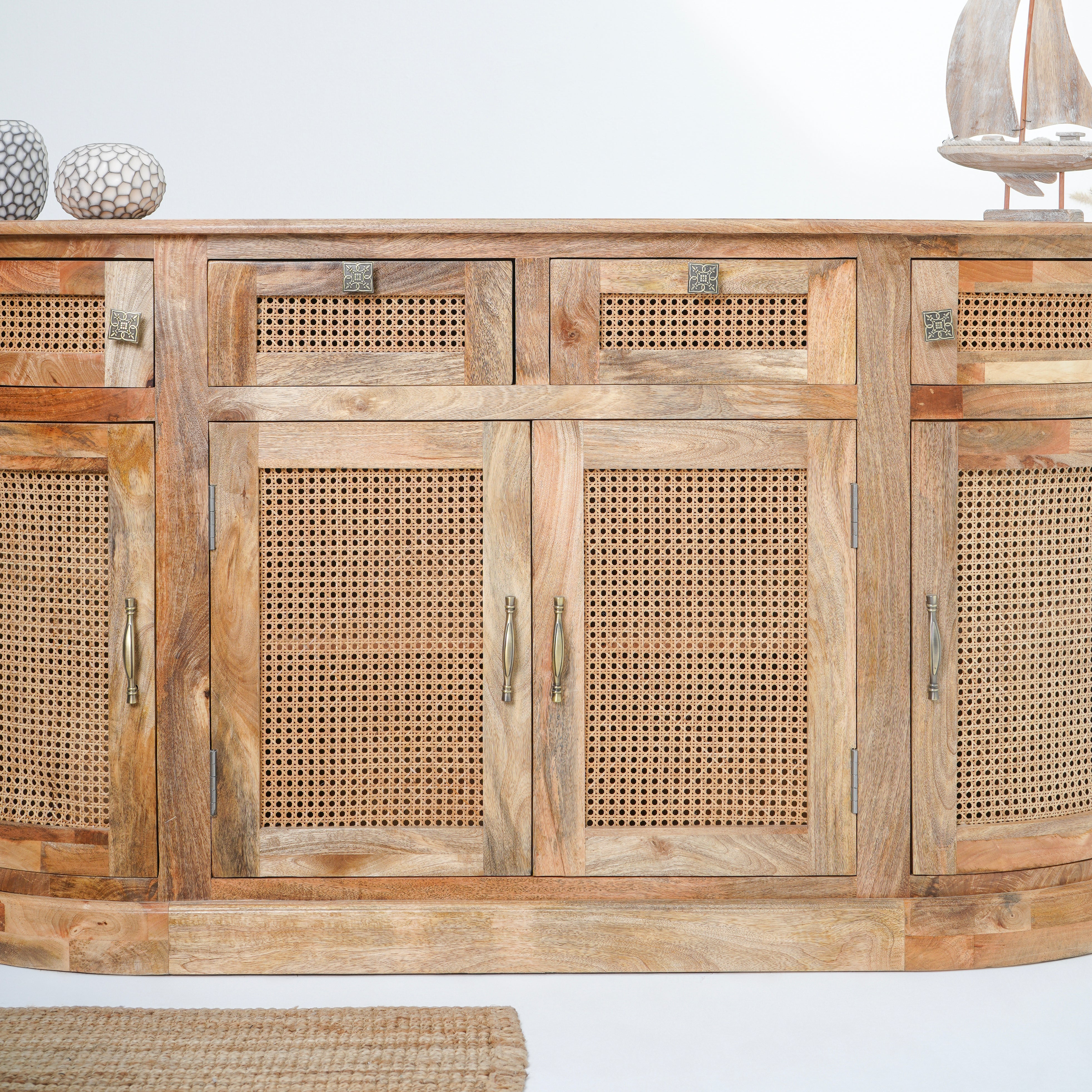 The Roslin cane four door four drawer sideboard