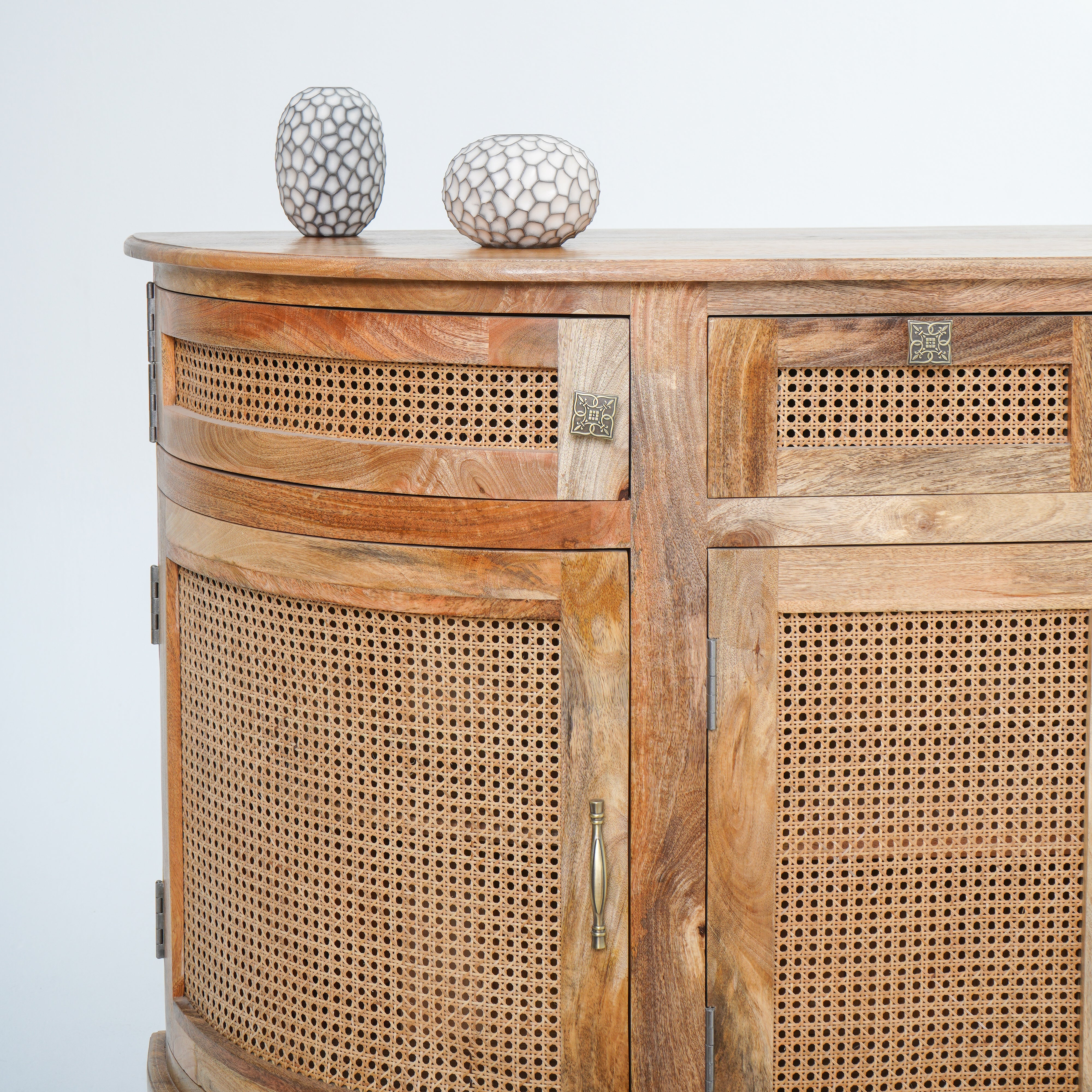 The Roslin cane four door four drawer sideboard