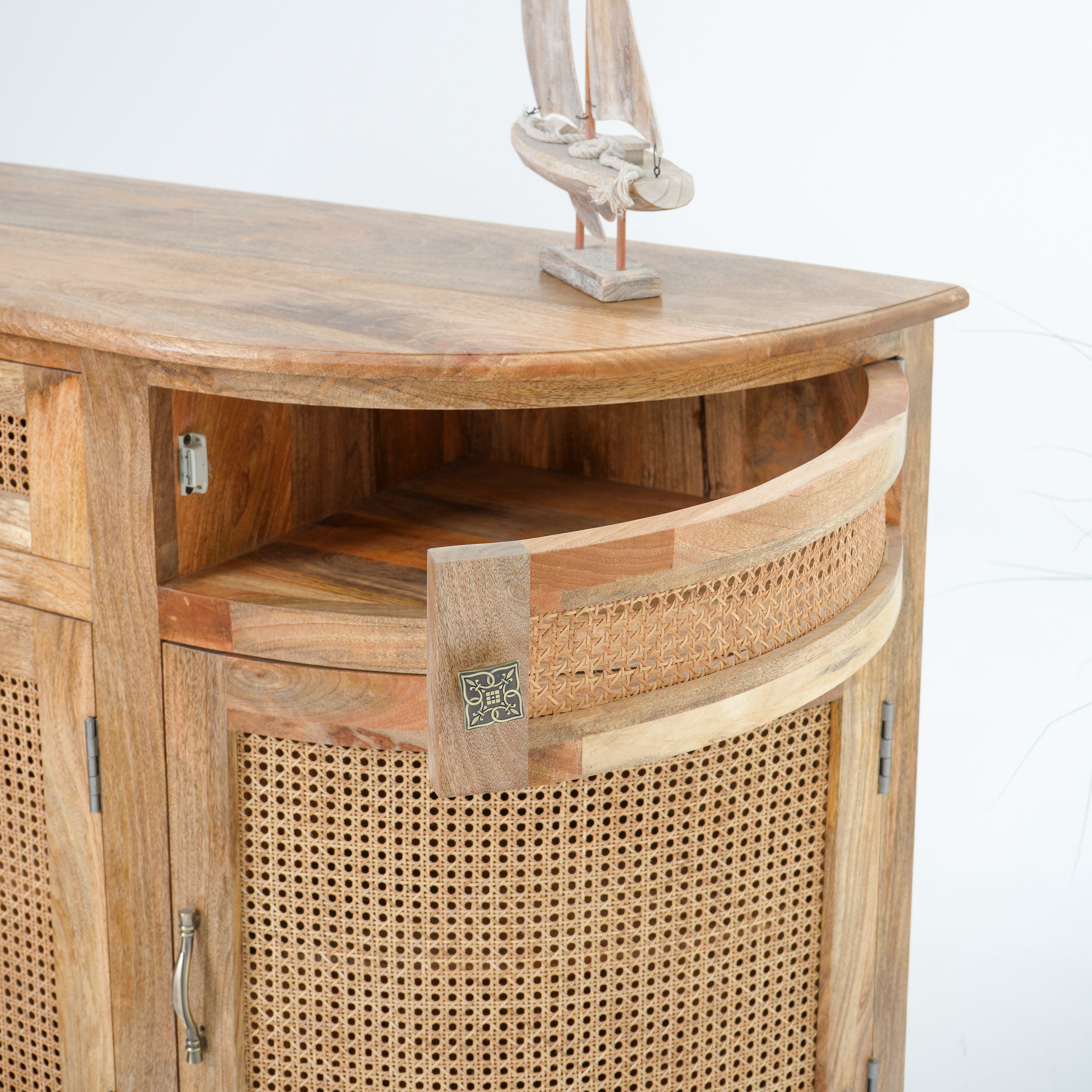 The Roslin cane four door four drawer sideboard