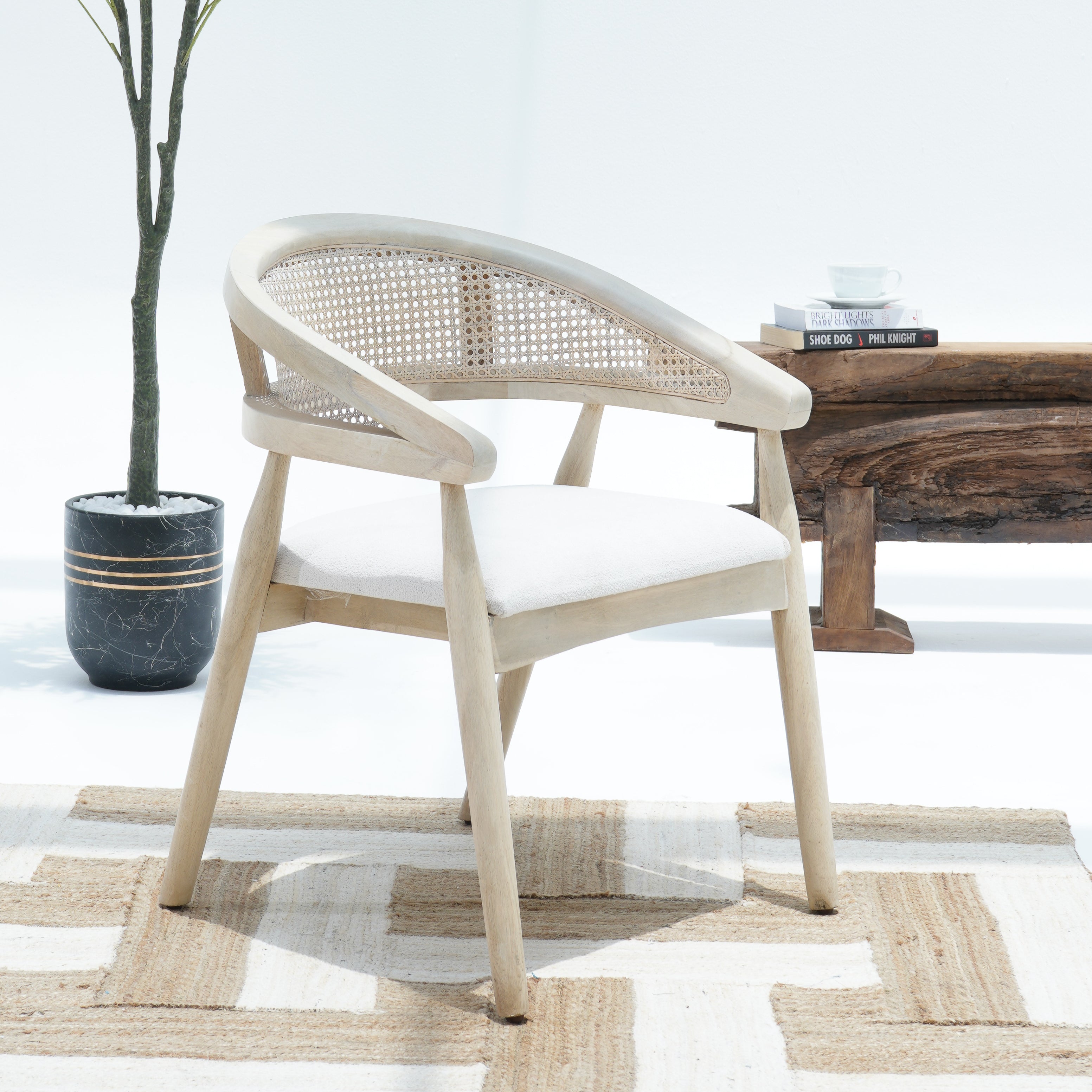 The Rattan Elegance Cane Chair